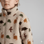 Sherpa Fleece Jacquard Dinosaurs Beige - Lametru.ro
